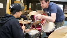BCMG musician Ben Markland advises a young drummer BCMG musician Ben Markland advises a young drummer