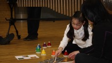 Creating birdsong at Family Music Maze Creating birdsong at Family Music Maze